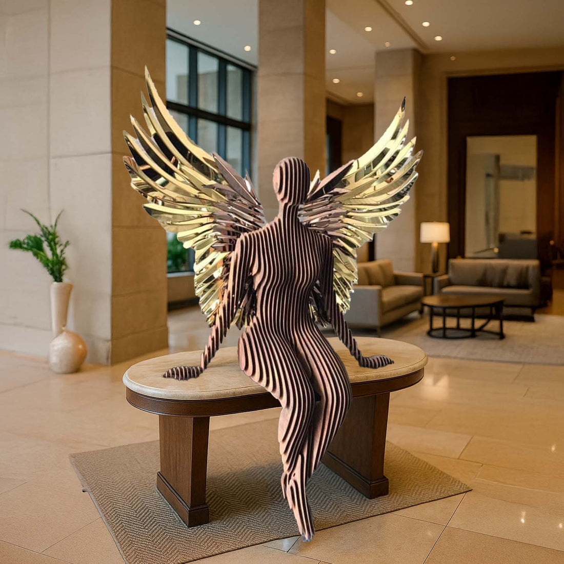 Contemporary abstract sculpture of a seated human figure with layered wooden-like body design and radiant golden wings, displayed elegantly in a luxurious indoor lobby setting.