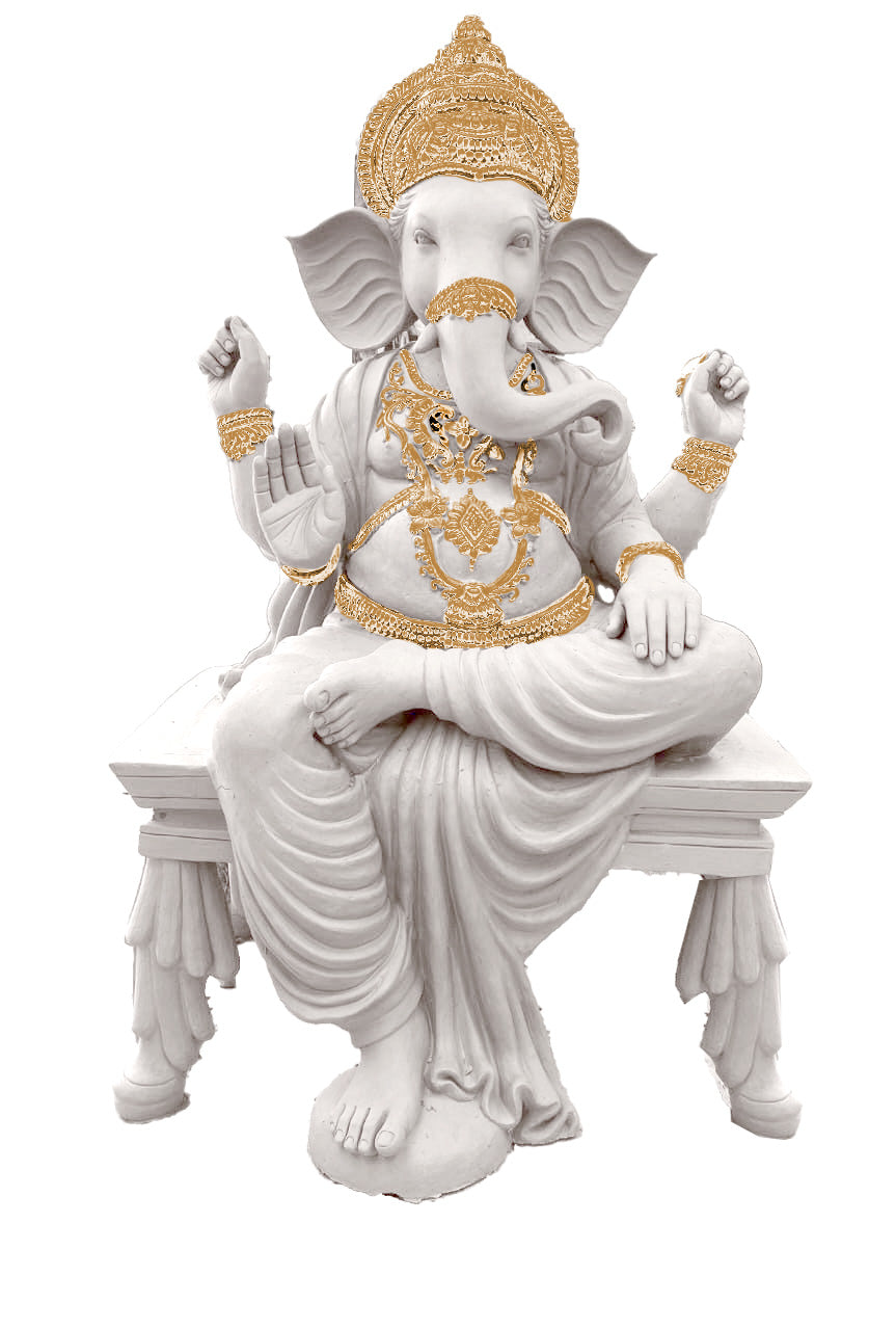 Majestic Lord Ganesha idol in white marble finish with intricate golden ornaments, seated on a decorative pedestal in front of a traditional carved wooden temple backdrop.