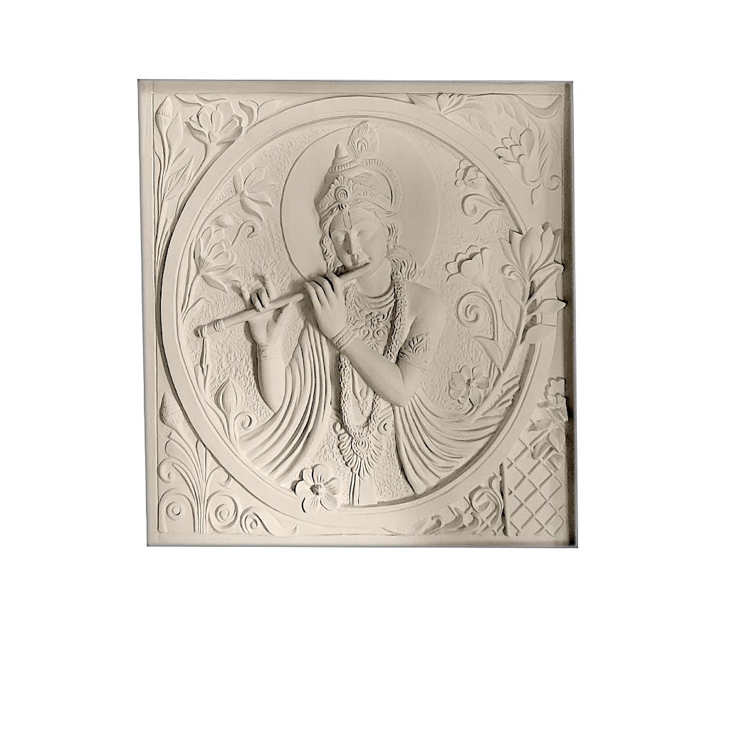 Elegant high-relief wall mural of Lord Krishna playing the flute, carved in a stone finish with intricate floral detailing, displayed in a temple-style architectural setting.