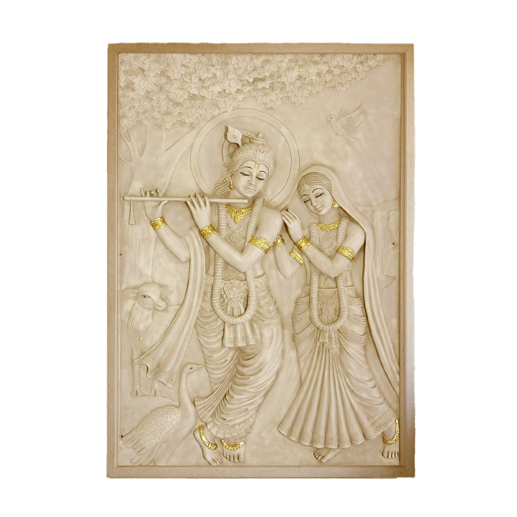 Elegant beige stone-finish high-relief wall mural of Lord Krishna playing the flute alongside Radha, adorned with golden accents, surrounded by nature elements including birds, peacocks, and trees, set in a traditional temple-style interior.